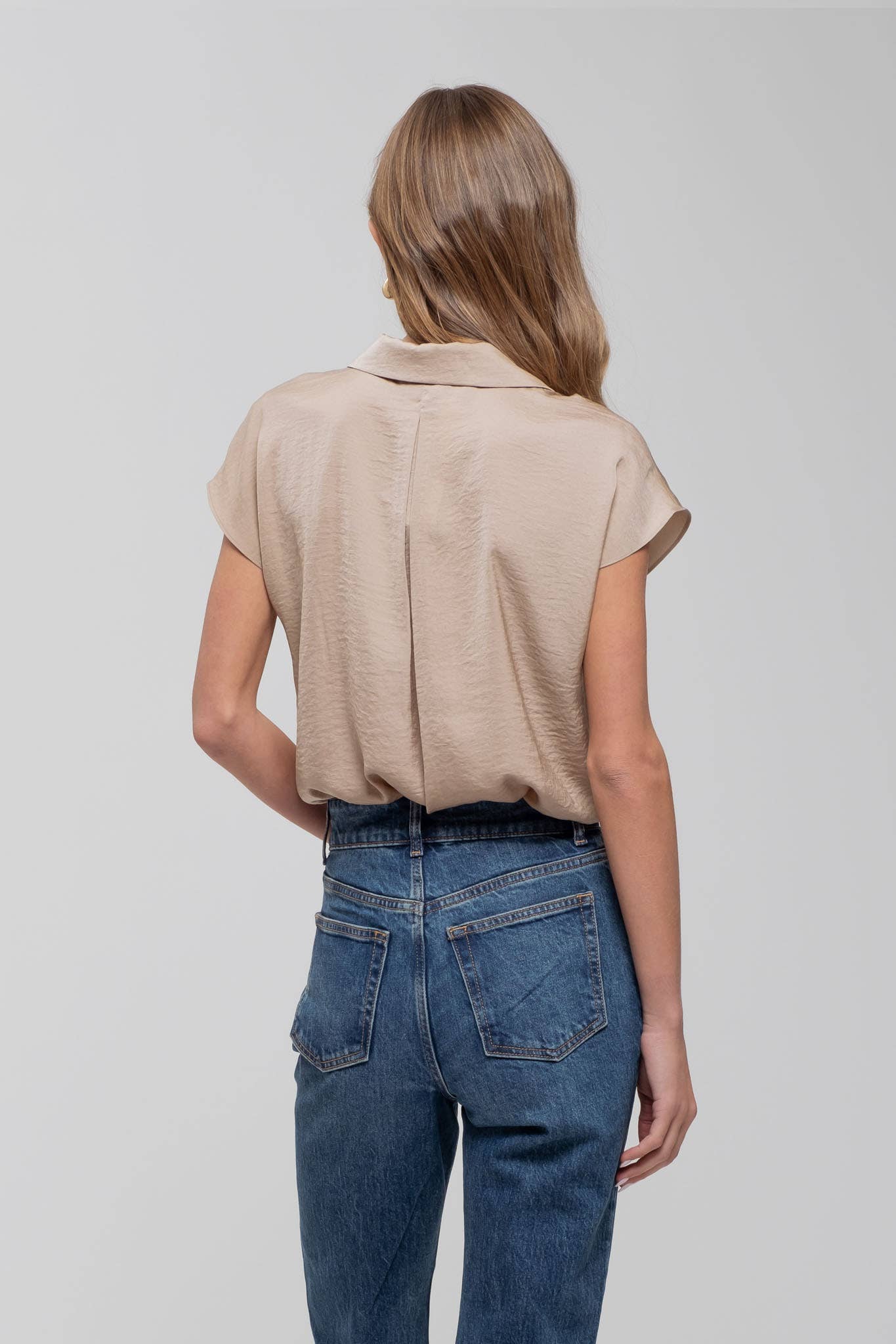 The Harper Sleeveless Button Down Top